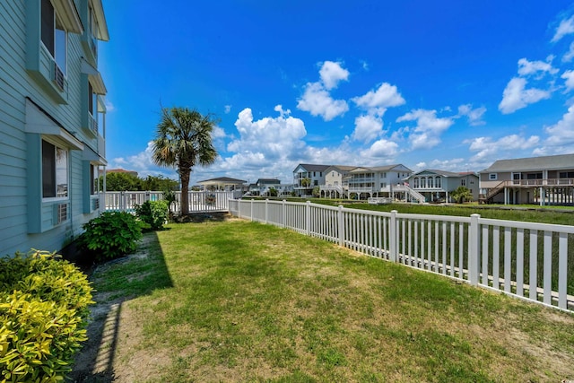 6301 N Ocean Blvd Unit 2B, North Myrtle Beach, SC 29582 - fenced backyard with a residential view