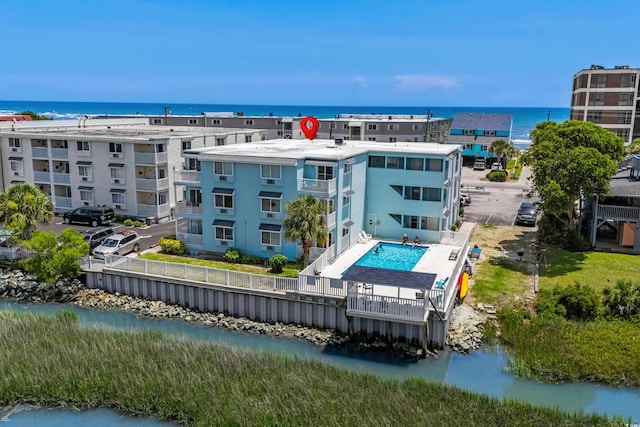 6301 N Ocean Blvd Unit 2B, North Myrtle Beach, SC 29582 - drone / aerial view of a large body of water and a pool