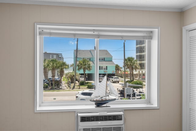 6301 N Ocean Blvd Unit 2B, North Myrtle Beach, SC 29582 - detailed view of heating unit, wooden walls, and crown molding