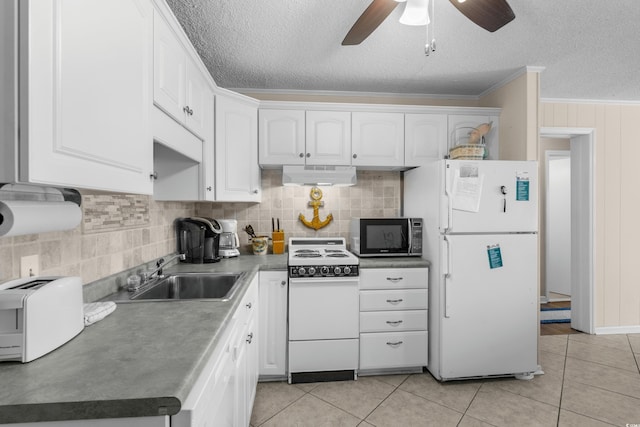6301 N Ocean Blvd Unit 2B, North Myrtle Beach, SC 29582 - kitchen featuring white appliances, under cabinet range hood, a textured ceiling, backsplash, and white cabinets