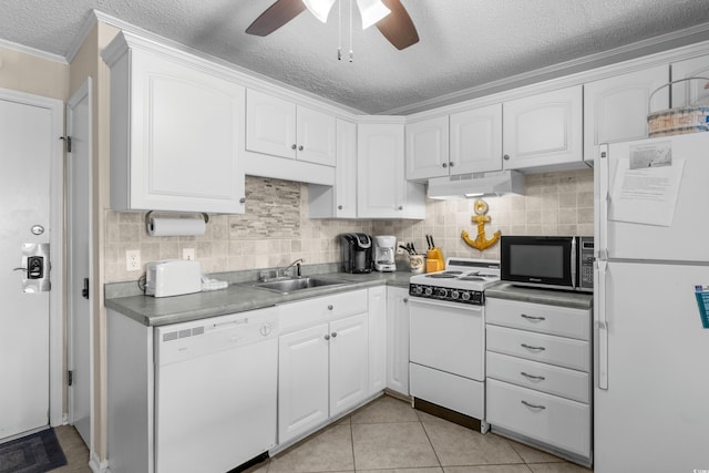 6301 N Ocean Blvd Unit 2B, North Myrtle Beach, SC 29582 - kitchen with white appliances, under cabinet range hood, a textured ceiling, white cabinetry, and ceiling fan