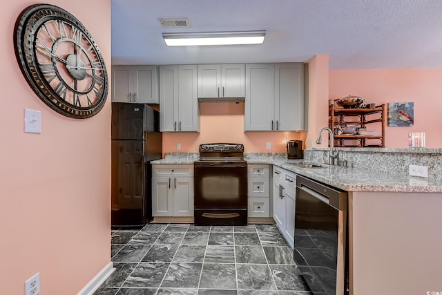 850 Fairway Dr Unit 904Ee, Longs, SC 29568 - kitchen featuring black appliances, gray cabinetry, light stone counters, and a peninsula