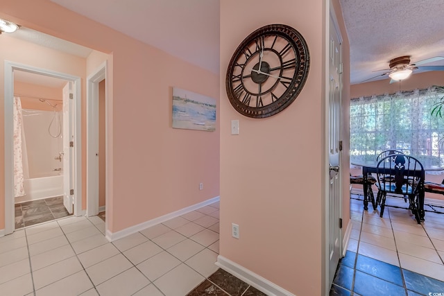 850 Fairway Dr Unit 904Ee, Longs, SC 29568 - hallway featuring light tile patterned floors and a textured ceiling