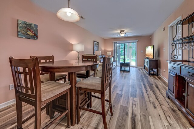 850 Fairway Dr Unit 904Ee, Longs, SC 29568 - dining area with light wood-style flooring and a ceiling fan
