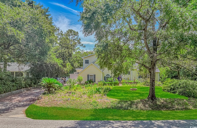 189 Aspen Loop, Pawleys Island, SC 29585 - view of green lawn featuring driveway