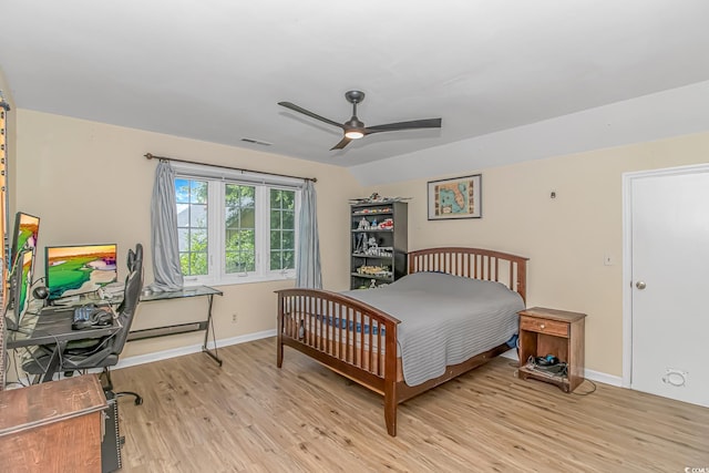 189 Aspen Loop, Pawleys Island, SC 29585 - bedroom featuring light wood-style floors, a baseboard heating unit, and a ceiling fan