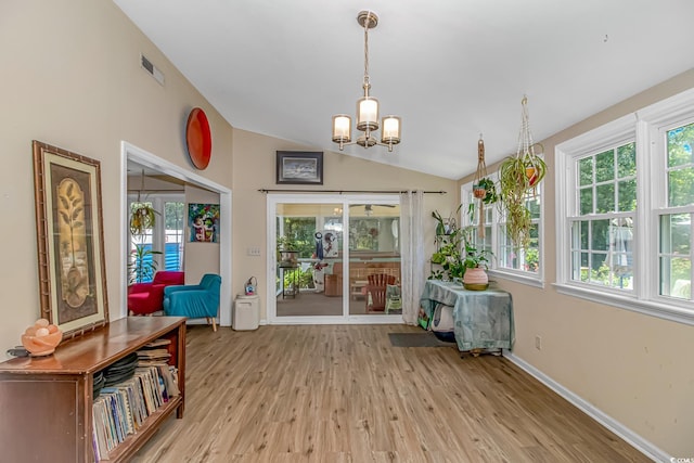189 Aspen Loop, Pawleys Island, SC 29585 - sunroom / solarium with lofted ceiling and a chandelier