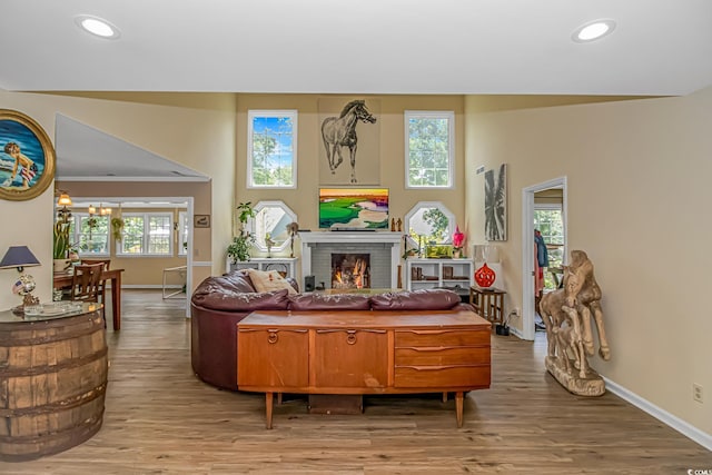 189 Aspen Loop, Pawleys Island, SC 29585 - living room with light wood-style flooring, a fireplace, recessed lighting, and ornamental molding