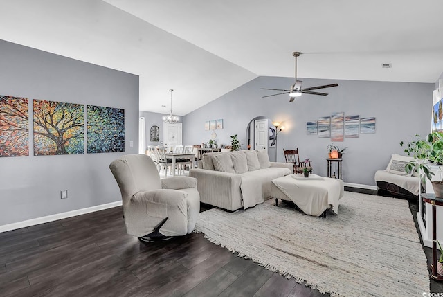 3907 Stillwood Dr, Myrtle Beach, SC 29588 - living area with dark wood-style flooring, vaulted ceiling, a ceiling fan, a chandelier, and arched walkways