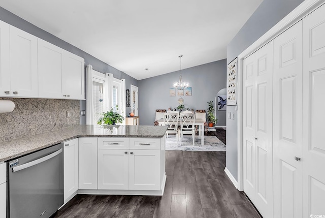3907 Stillwood Dr, Myrtle Beach, SC 29588 - kitchen with dishwasher, a peninsula, a chandelier, and white cabinets