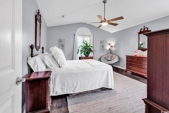 3907 Stillwood Dr, Myrtle Beach, SC 29588 - bedroom with wood finished floors, vaulted ceiling, and a ceiling fan