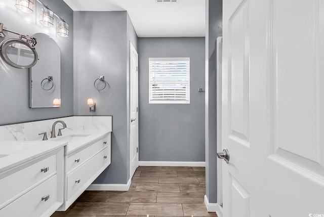 3907 Stillwood Dr, Myrtle Beach, SC 29588 - bathroom with vanity and wood finished floors