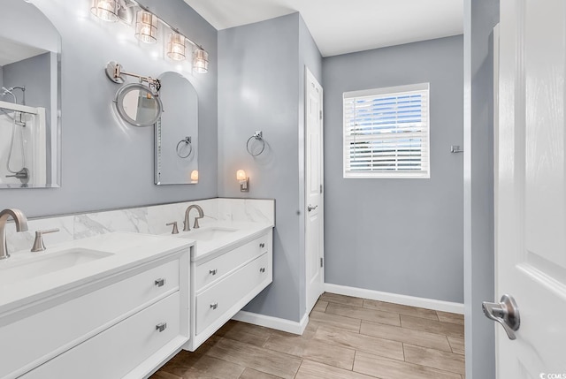 3907 Stillwood Dr, Myrtle Beach, SC 29588 - full bath with double vanity and wood finish floors
