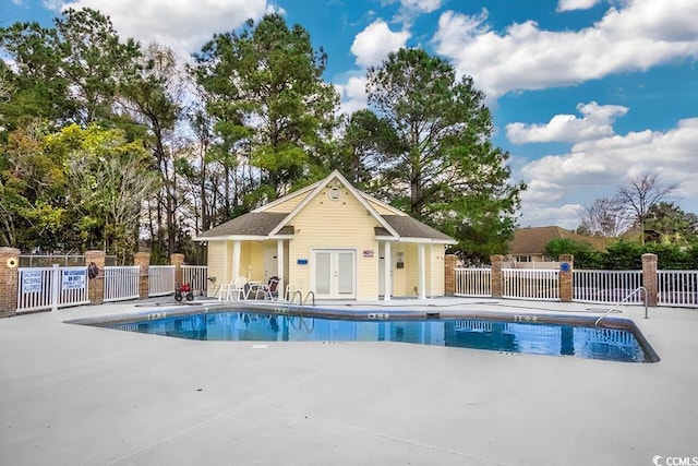 3907 Stillwood Dr, Myrtle Beach, SC 29588 - community pool featuring a patio area