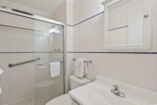 1820 N Ocean Blvd Unit 303D, North Myrtle Beach, SC 29582 - full bath featuring ornamental molding, a stall shower, vanity, and tile walls