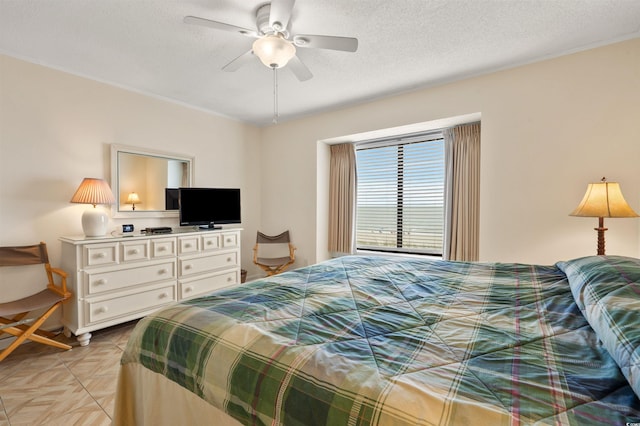 1820 N Ocean Blvd Unit 303D, North Myrtle Beach, SC 29582 - bedroom featuring a textured ceiling and a ceiling fan