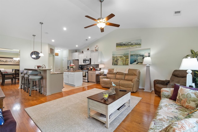178 Parmalee Dr Unit C, Murrells Inlet, SC 29576 - living room featuring a ceiling fan, vaulted ceiling, light wood-style floors, and recessed lighting