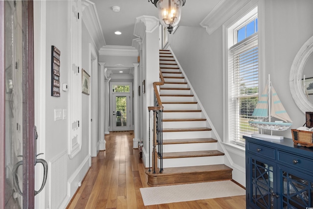 350 Saint Julian Ln, Myrtle Beach, SC 29579 - foyer featuring healthy amount of natural light, crown molding, stairs, light wood-style floors, and recessed lighting