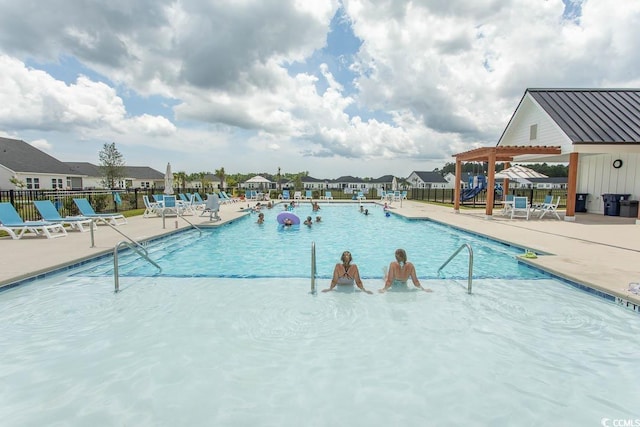 435 Rollins Dr, Longs, SC 29568 - community pool with a patio area and a residential view