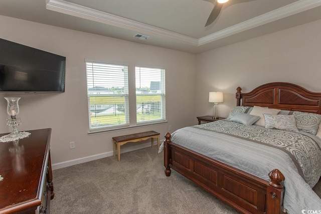 435 Rollins Dr, Longs, SC 29568 - bedroom with ornamental molding, light colored carpet, a tray ceiling, and ceiling fan