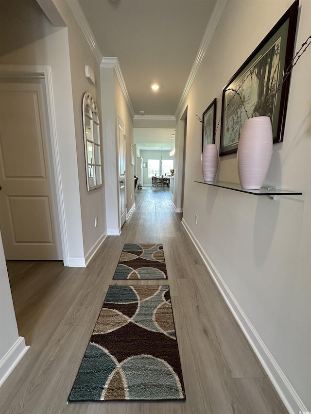 435 Rollins Dr, Longs, SC 29568 - hall with wood finished floors, ornamental molding, and recessed lighting