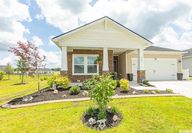 435 Rollins Dr, Longs, SC 29568 - craftsman inspired home with an attached garage, driveway, a front lawn, a porch, and stone siding