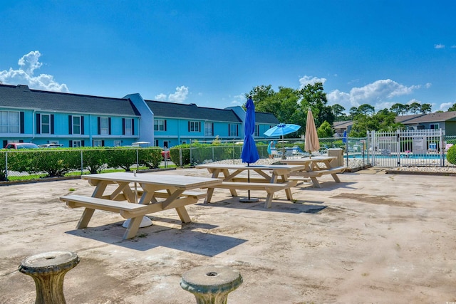 832 Villa Dr Unit 832, North Myrtle Beach, SC 29582 - view of community with outdoor dining area, a patio area, and a pool