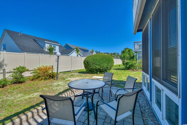 832 Villa Dr Unit 832, North Myrtle Beach, SC 29582 - fenced backyard with a patio area and outdoor dining space
