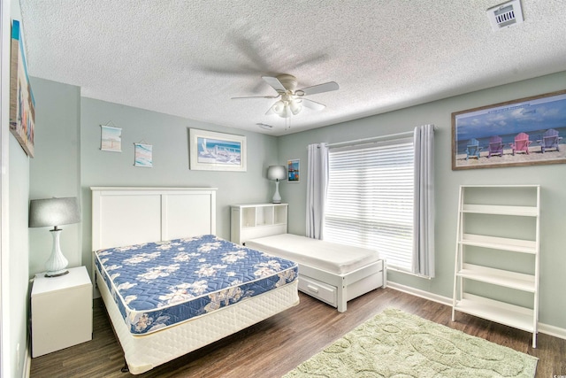 832 Villa Dr Unit 832, North Myrtle Beach, SC 29582 - bedroom with wood finished floors, a ceiling fan, and a textured ceiling