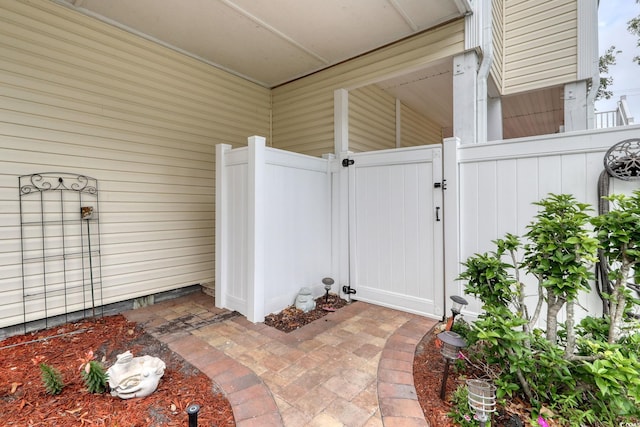 505 41st Ave S, North Myrtle Beach, SC 29582 - view of exterior entry with a gate