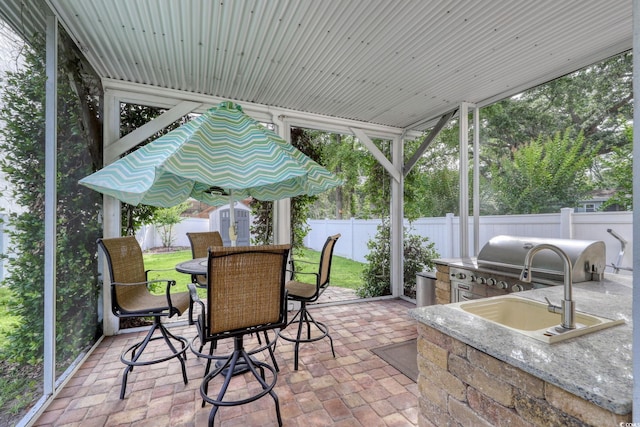 505 41st Ave S, North Myrtle Beach, SC 29582 - fenced backyard featuring a shed, a patio area, outdoor dining space, and area for grilling