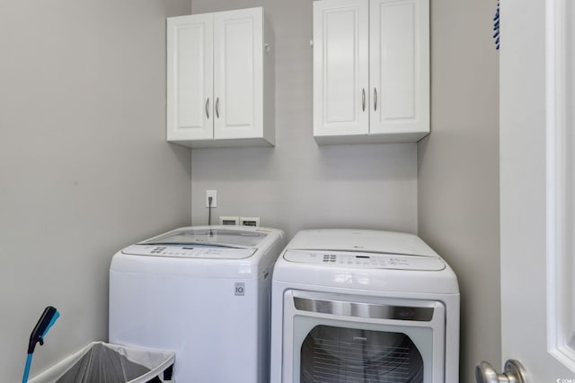 505 41st Ave S, North Myrtle Beach, SC 29582 - laundry area featuring cabinet space and washer and clothes dryer
