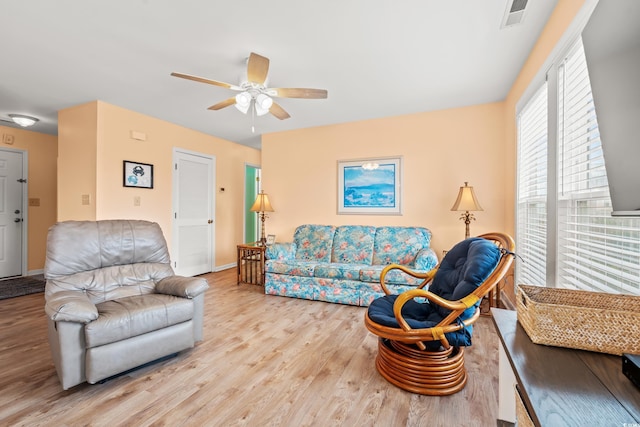 212 29th Ave N Unit 204, North Myrtle Beach, SC 29582 - living area with wood finished floors and a ceiling fan