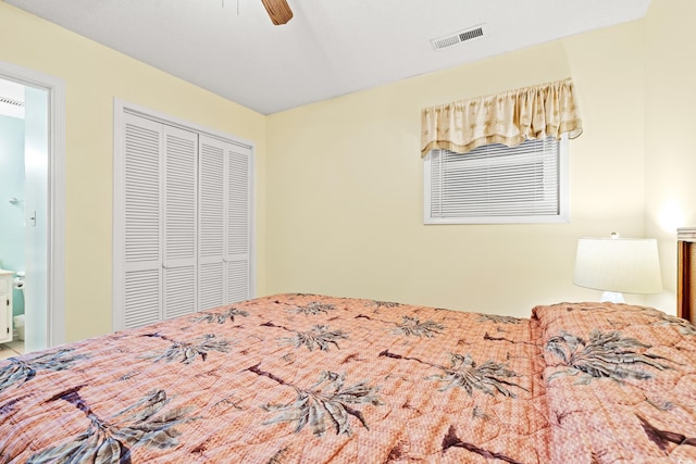 212 29th Ave N Unit 204, North Myrtle Beach, SC 29582 - bedroom featuring a closet, ceiling fan, and ensuite bathroom