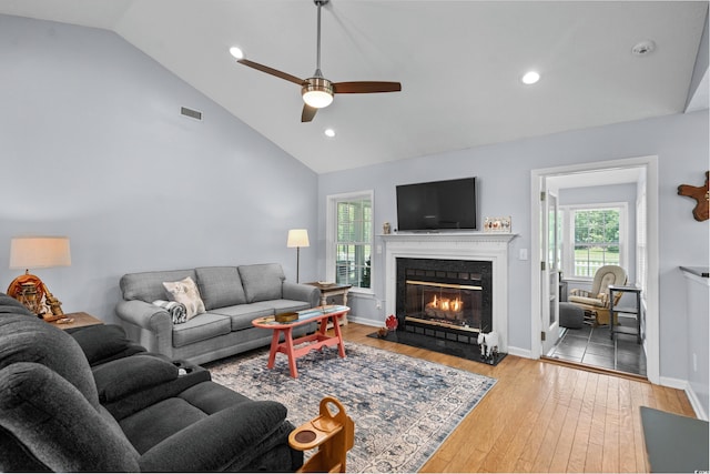 483 Oakmont Dr, Myrtle Beach, SC 29579 - living area featuring ceiling fan, a fireplace with flush hearth, light wood finished floors, high vaulted ceiling, and recessed lighting