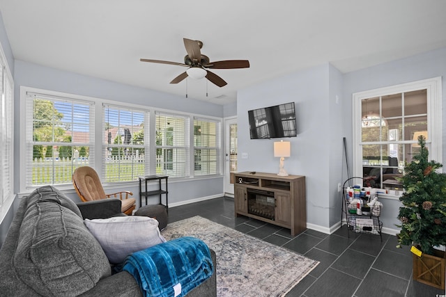 483 Oakmont Dr, Myrtle Beach, SC 29579 - living room with a ceiling fan, healthy amount of natural light, and dark tile patterned floors