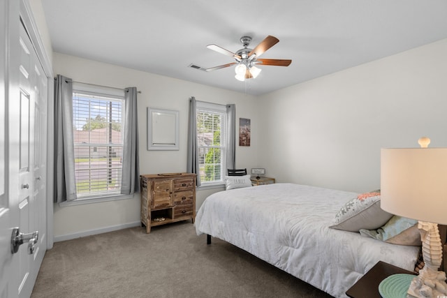 483 Oakmont Dr, Myrtle Beach, SC 29579 - carpeted bedroom featuring a ceiling fan and a closet