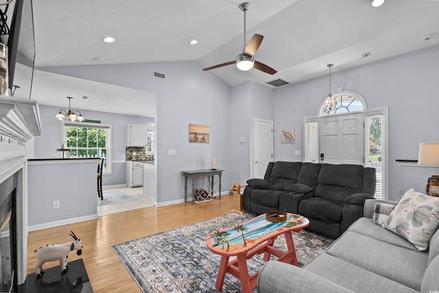 483 Oakmont Dr, Myrtle Beach, SC 29579 - living area with a chandelier, light wood finished floors, high vaulted ceiling, a ceiling fan, and recessed lighting