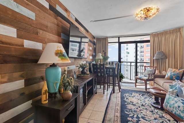 1501 S Ocean Blvd Unit 1548, Myrtle Beach, SC 29577 - living area with light tile patterned floors, wood walls, and floor to ceiling windows