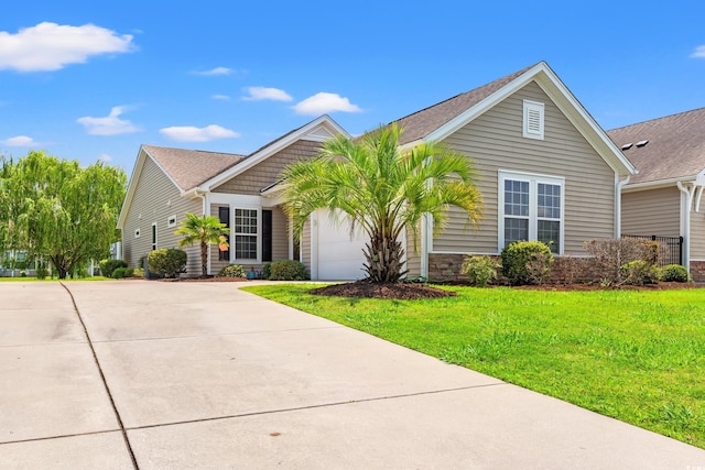 1590 Palmina Loop Unit A, Myrtle Beach, SC 29588 - view of front facade with an attached garage, a front lawn, and driveway