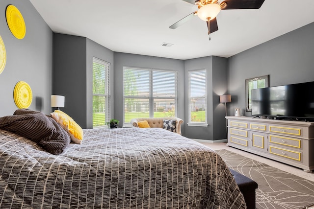 1590 Palmina Loop Unit A, Myrtle Beach, SC 29588 - carpeted bedroom with multiple windows and ceiling fan