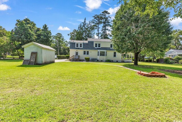 203 Lakeland Dr, Conway, SC 29526 - view of grassy yard with a storage shed