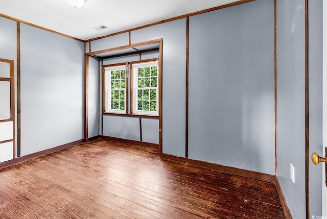 203 Lakeland Dr, Conway, SC 29526 - empty room featuring wood-type flooring and crown molding