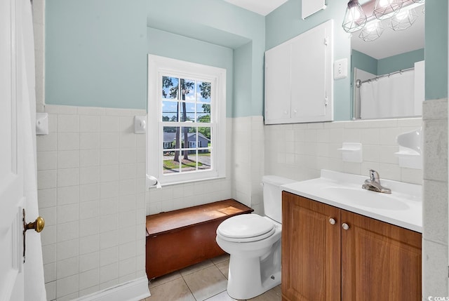 203 Lakeland Dr, Conway, SC 29526 - bathroom with tile walls, vanity, tile patterned flooring, and wainscoting
