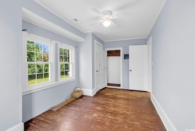 203 Lakeland Dr, Conway, SC 29526 - unfurnished bedroom with wood finished floors, ornamental molding, a closet, and a ceiling fan