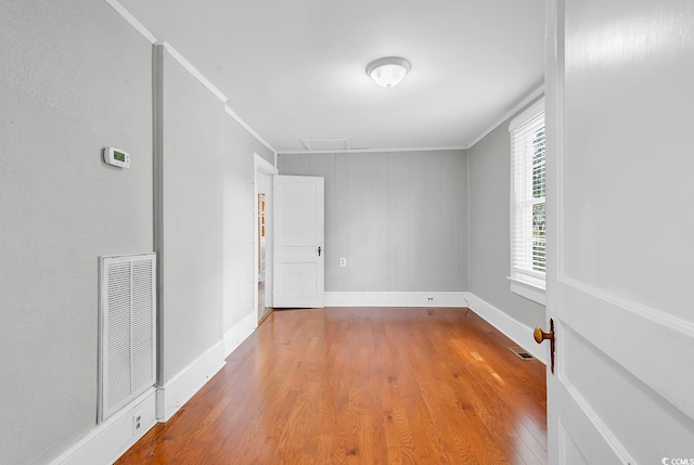 203 Lakeland Dr, Conway, SC 29526 - spare room with wood finished floors and ornamental molding
