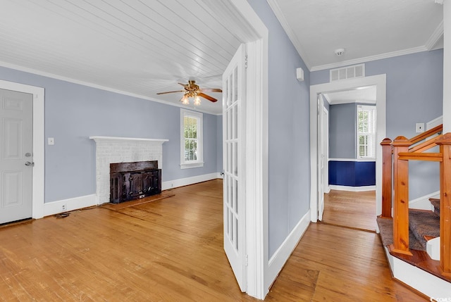 203 Lakeland Dr, Conway, SC 29526 - hall featuring plenty of natural light, stairway, wood finished floors, and ornamental molding
