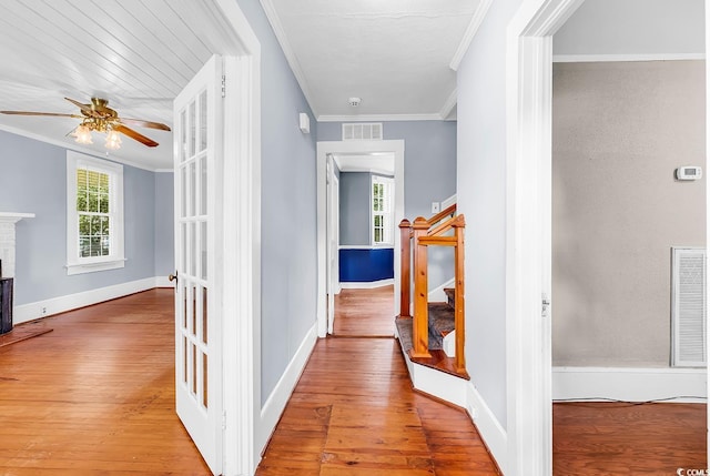 203 Lakeland Dr, Conway, SC 29526 - hallway with crown molding, hardwood / wood-style flooring, and stairs