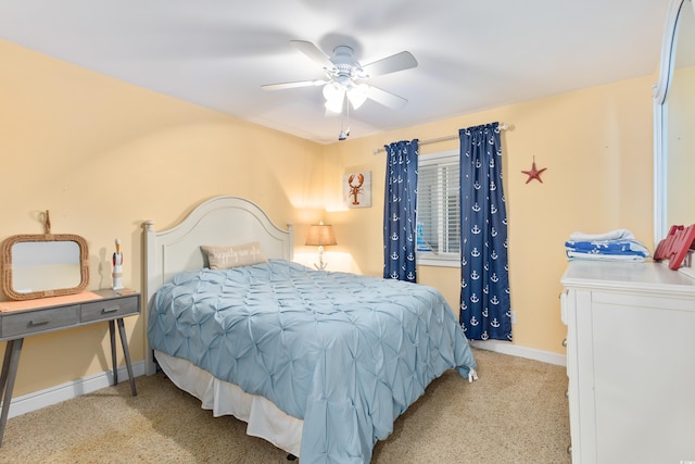 5000 N Ocean Blvd Unit E-2, North Myrtle Beach, SC 29582 - carpeted bedroom with baseboards and a ceiling fan