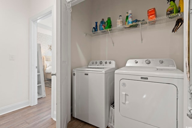 1428 Lanterns Rest Rd Unit 1428, Myrtle Beach, SC 29579 - washroom with washer and clothes dryer and light wood-style floors